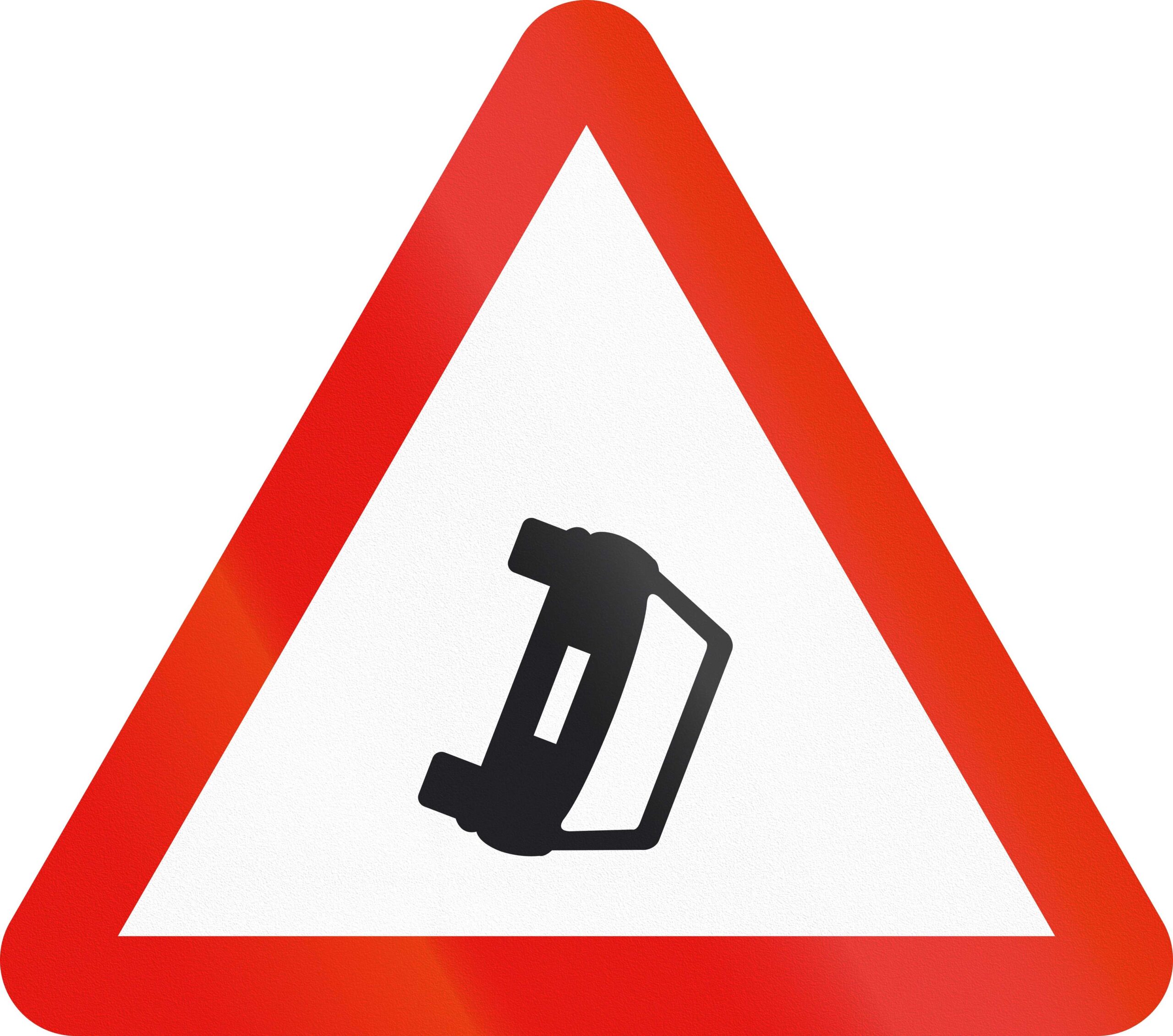 White triangular road sign with red border and image of car on its side.