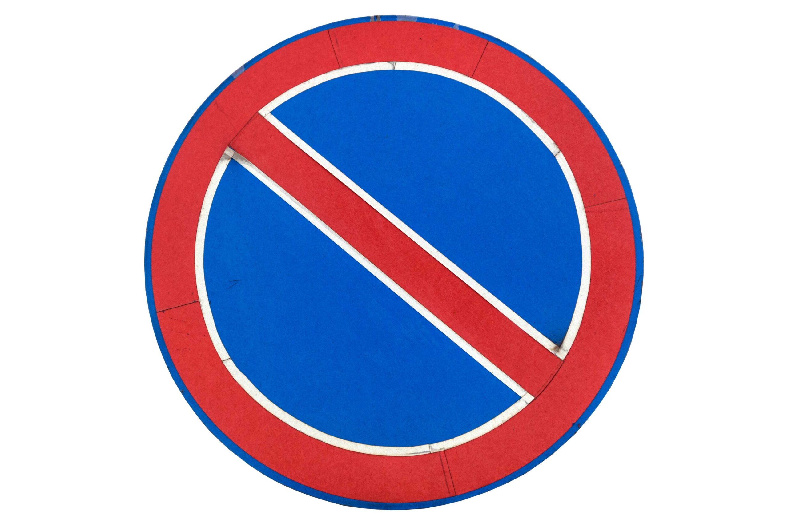 Blue circle with thick red border on the outside and diagonal line from the top left through to the bottom right.